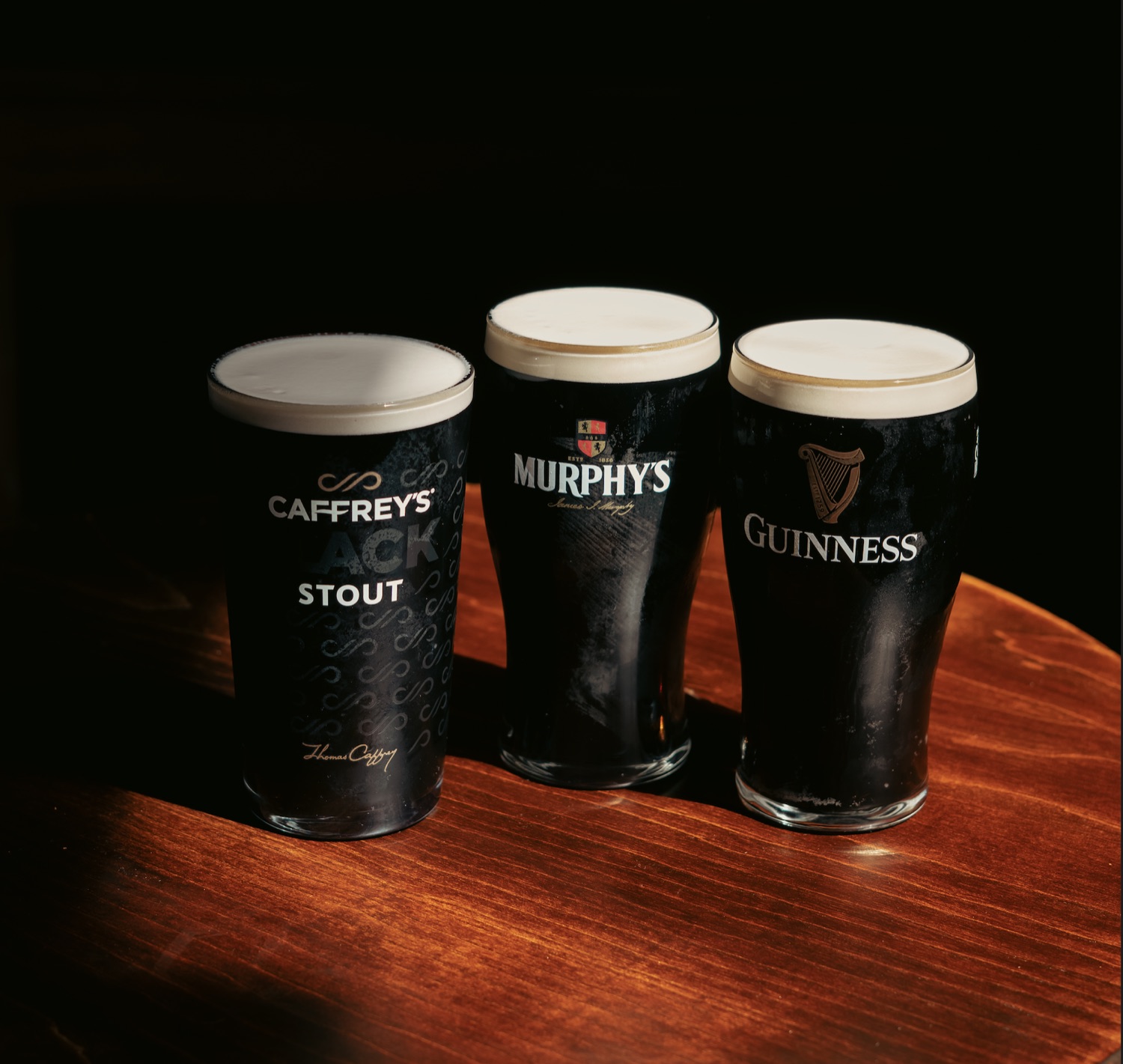 Caffrey’s, Murphy’s and Guinness poured side by side